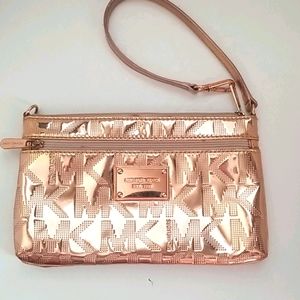 Michael Kors wristlet metallic rose gold